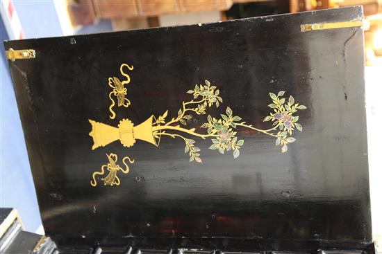 A late 17th century Chinese black lacquer cabinet, overall H. 5ft 3in.